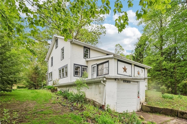 1770 Perry Hwy, Muddy Creek Twp, PA 16051 - rear view of property featuring an attached garage