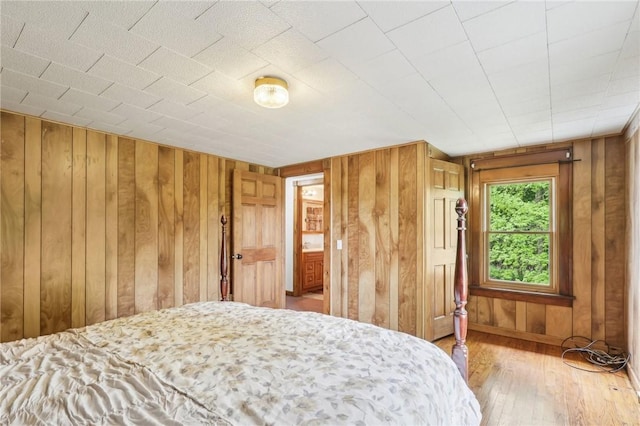 1770 Perry Hwy, Muddy Creek Twp, PA 16051 - bedroom with wooden walls and hardwood / wood-style flooring