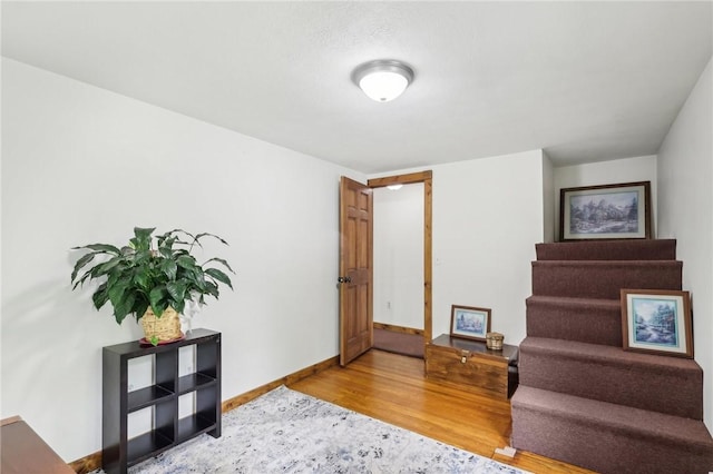1770 Perry Hwy, Muddy Creek Twp, PA 16051 - sitting room featuring wood finished floors, baseboards, and stairs