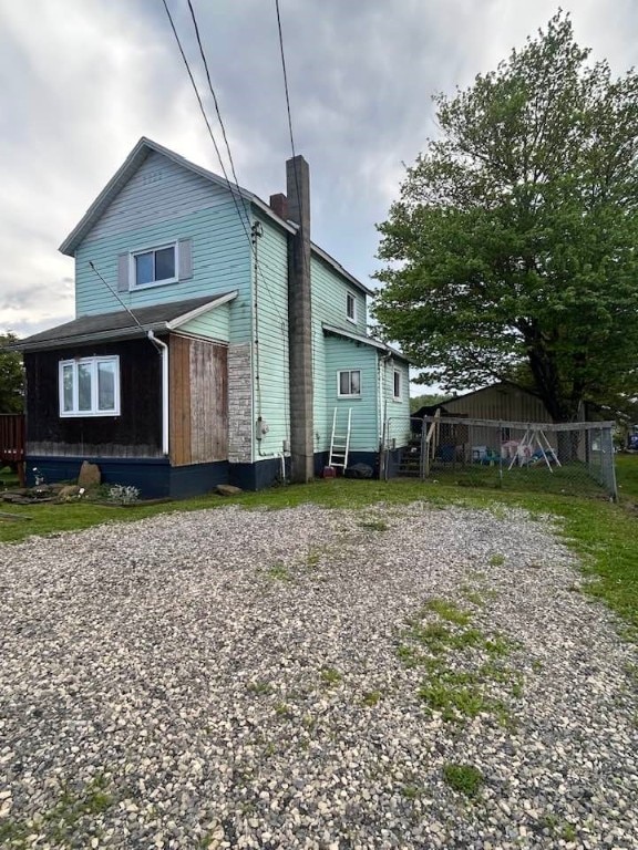 515 Green St, Saltsburg Area, PA 15681 - rear view of house featuring a chimney