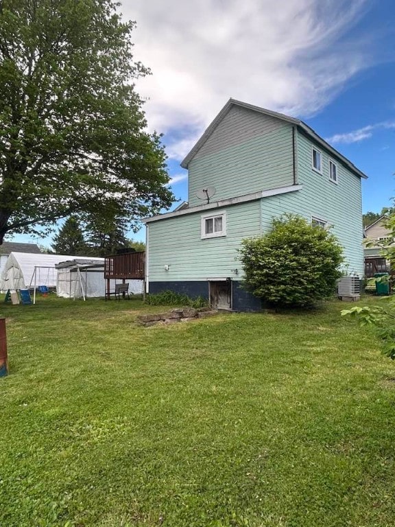 515 Green St, Saltsburg Area, PA 15681 - view of side of home featuring central air condition unit and a lawn