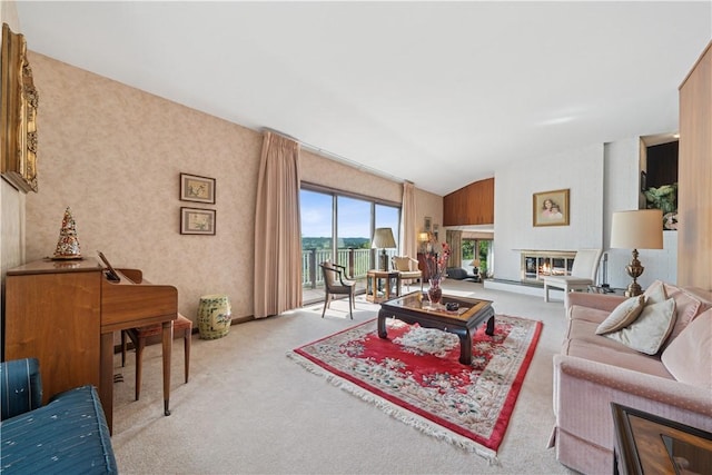 257 Penhurst Dr, Wilkins Twp, PA 15235 - carpeted living area featuring lofted ceiling and a glass covered fireplace