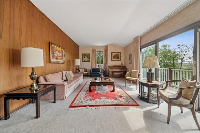 257 Penhurst Dr, Wilkins Twp, PA 15235 - living area featuring carpet flooring, plenty of natural light, and wood walls
