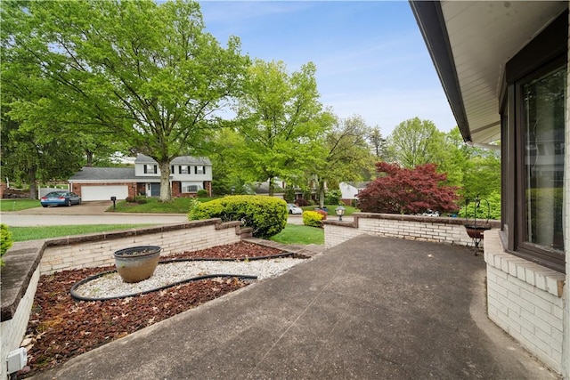 257 Penhurst Dr, Wilkins Twp, PA 15235 - view of yard featuring a patio area