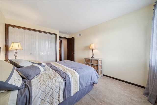 257 Penhurst Dr, Wilkins Twp, PA 15235 - bedroom with carpet, a closet, and baseboards