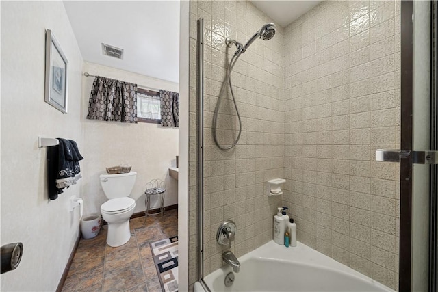 257 Penhurst Dr, Wilkins Twp, PA 15235 - full bathroom with toilet, washtub / shower combination, baseboards, and stone finish flooring