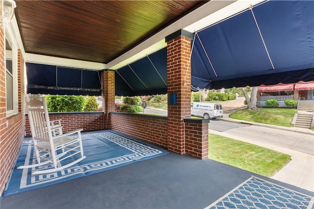 view of patio featuring covered porch