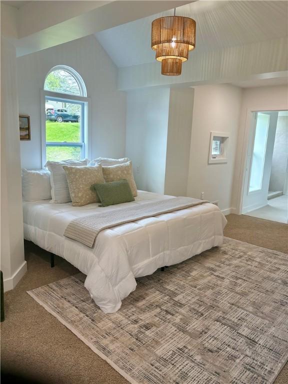 10 Neptune Dr, Robinson Twp Nwa, PA 15136 - carpeted bedroom with baseboards and lofted ceiling