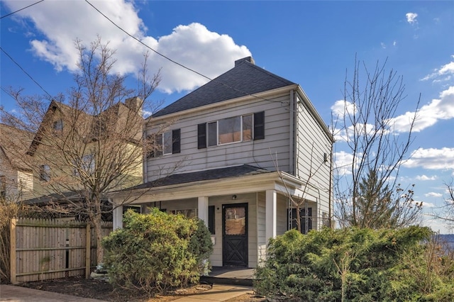 2252 Milligan Ave, Swissvale, PA 15218 - view of front of home with fence, covered porch, and roof with shingles