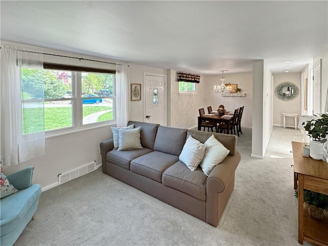 550 Brushglen Ln, Pleasant Hills, PA 15236 - living room featuring carpet, a chandelier, and baseboards