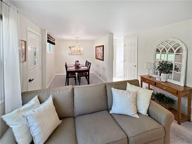 550 Brushglen Ln, Pleasant Hills, PA 15236 - living room featuring carpet floors, a chandelier, and baseboards