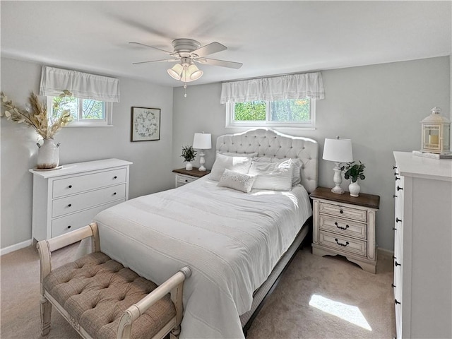 550 Brushglen Ln, Pleasant Hills, PA 15236 - bedroom with light colored carpet, multiple windows, baseboards, and ceiling fan