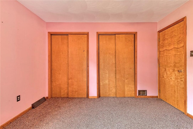 5569 Camerons Rd, Brush Val/Buffington, PA 15748 - unfurnished bedroom with multiple closets and carpet floors
