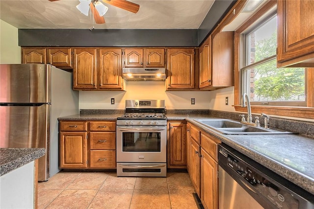5569 Camerons Rd, Brush Val/Buffington, PA 15748 - kitchen featuring appliances with stainless steel finishes, under cabinet range hood, a sink, and brown cabinets