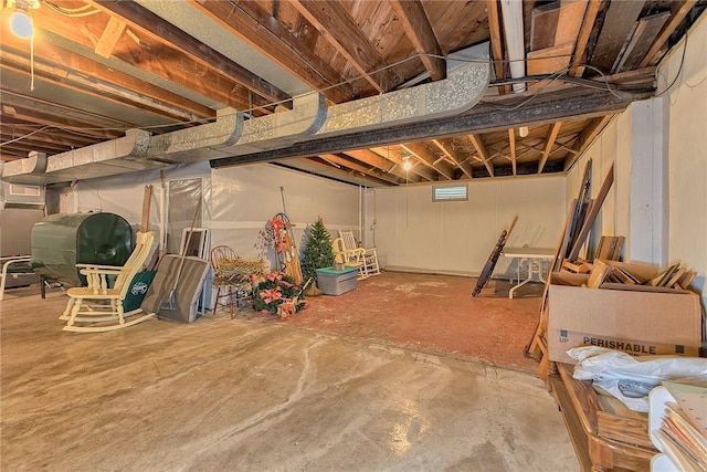 unfinished below grade area featuring heating fuel