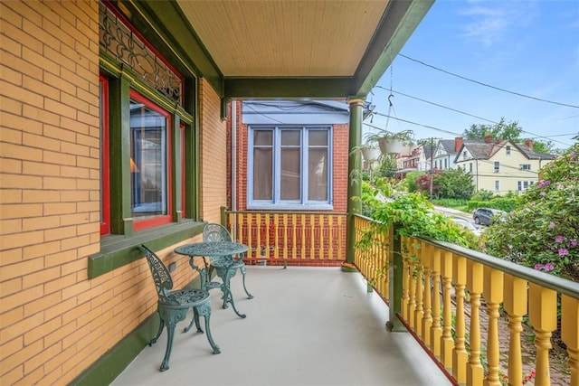 balcony featuring covered porch