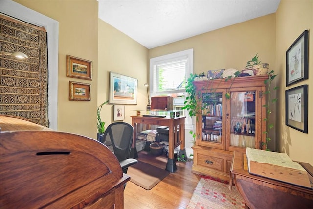 office space with wood finished floors