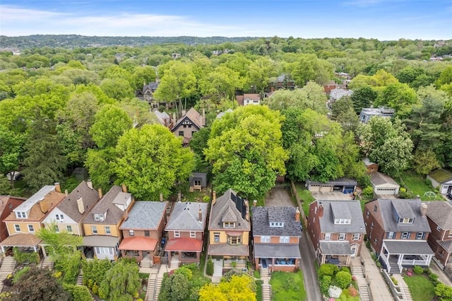 aerial overview of property's location with nearby suburban area