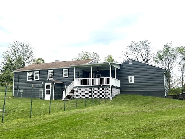 220 Baird Rd, Mahoning Twp Law, PA 16116 - rear view of property featuring a ceiling fan and stairs