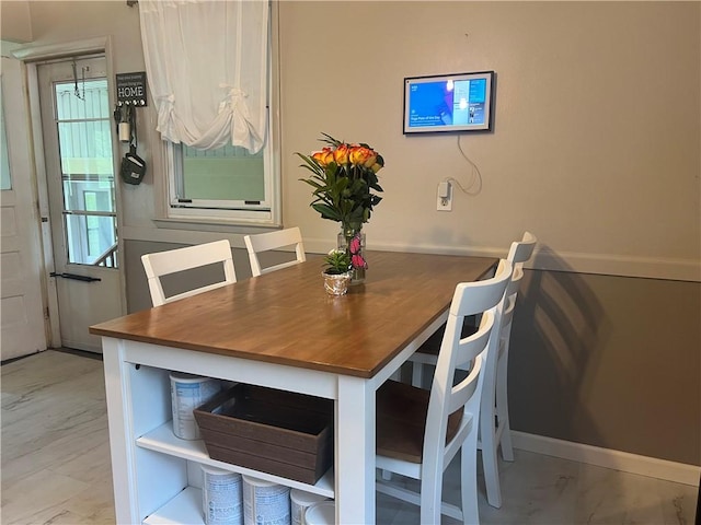 220 Baird Rd, Mahoning Twp Law, PA 16116 - dining space with marble finish floors and baseboards