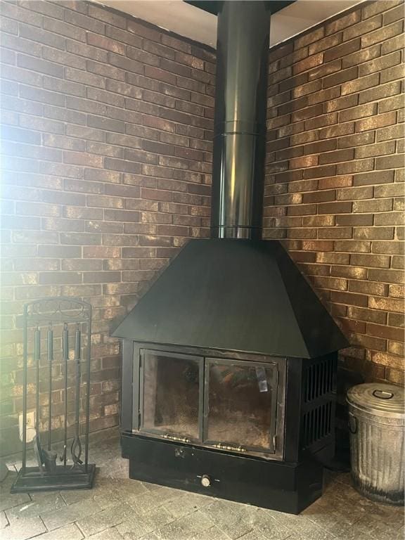 220 Baird Rd, Mahoning Twp Law, PA 16116 - detailed view of a wood stove and brick wall