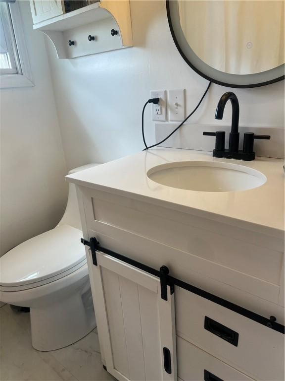 220 Baird Rd, Mahoning Twp Law, PA 16116 - bathroom featuring vanity and toilet