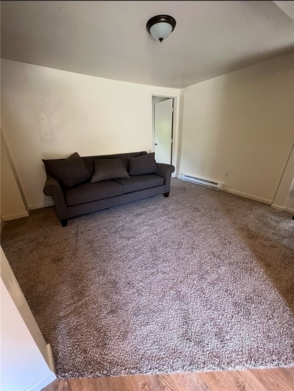 449 N Water Ave, Sharon, PA 16146 - living room with a baseboard heating unit, carpet flooring, and baseboards