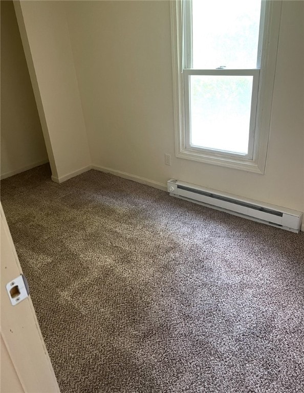 449 N Water Ave, Sharon, PA 16146 - unfurnished room with a baseboard heating unit, carpet, and baseboards