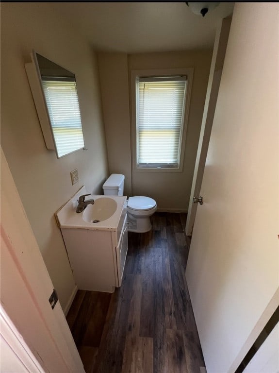 449 N Water Ave, Sharon, PA 16146 - bathroom featuring toilet, healthy amount of natural light, wood finished floors, and vanity