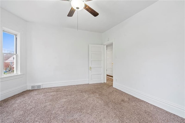 3277 Tuxedo St, Sheraden, PA 15204 - empty room with carpet, a ceiling fan, and baseboards