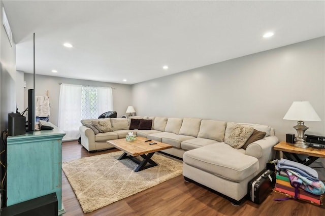 living room featuring wood finished floors and recessed lighting