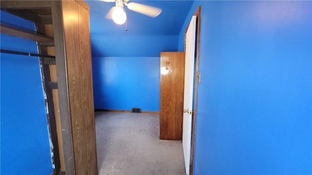 hall featuring carpet floors