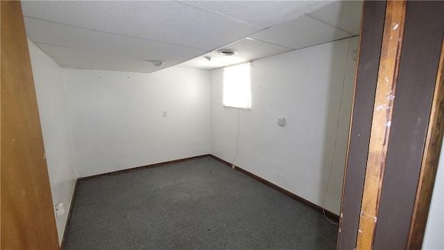 basement with carpet and baseboards