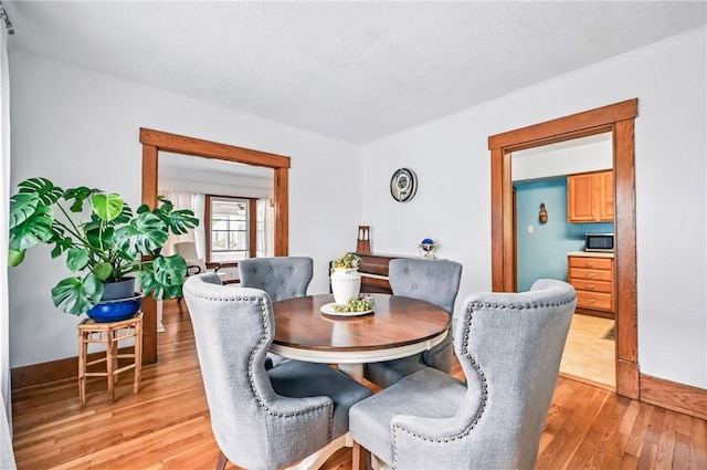 188 Taylor Ave, Sharon, PA 16146 - dining room with light wood-type flooring and baseboards