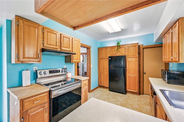 188 Taylor Ave, Sharon, PA 16146 - kitchen with appliances with stainless steel finishes, under cabinet range hood, light countertops, and a sink