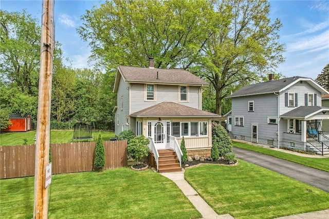 188 Taylor Ave, Sharon, PA 16146 - traditional style home with a shingled roof, a chimney, and asphalt driveway