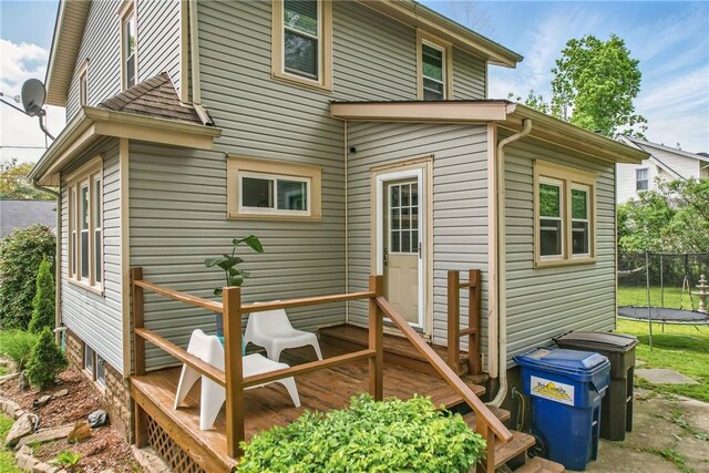 188 Taylor Ave, Sharon, PA 16146 - back of house with a trampoline and a wooden deck