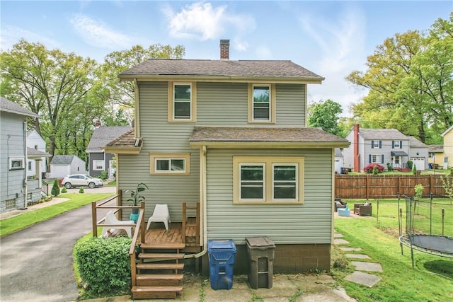 188 Taylor Ave, Sharon, PA 16146 - back of property featuring a chimney, a wooden deck, and roof with shingles