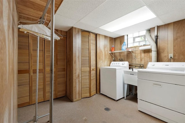 1023 Harrison St, Bethel Park, PA 15234 - washroom with independent washer and dryer, wooden walls, and light carpet