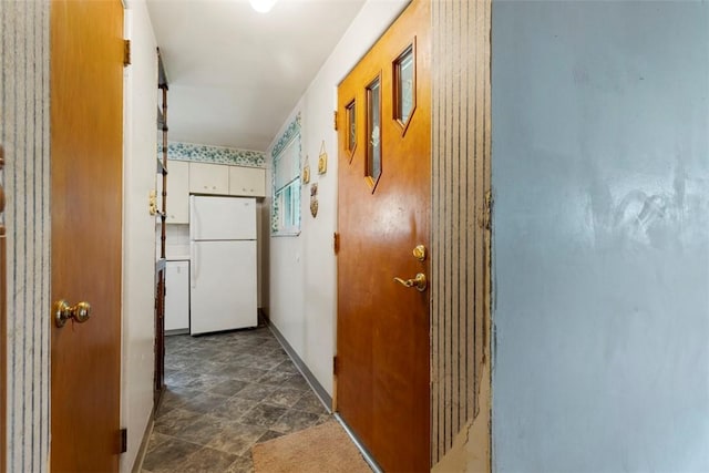 1023 Harrison St, Bethel Park, PA 15234 - hallway featuring stone finish floors and baseboards