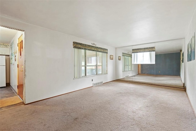 1023 Harrison St, Bethel Park, PA 15234 - carpeted spare room featuring baseboards