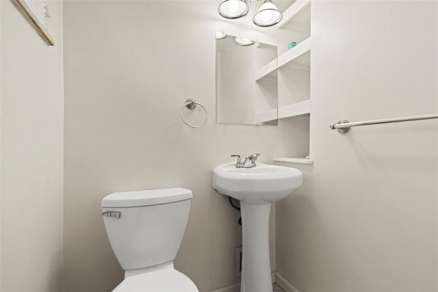1023 Harrison St, Bethel Park, PA 15234 - half bathroom with toilet and a sink