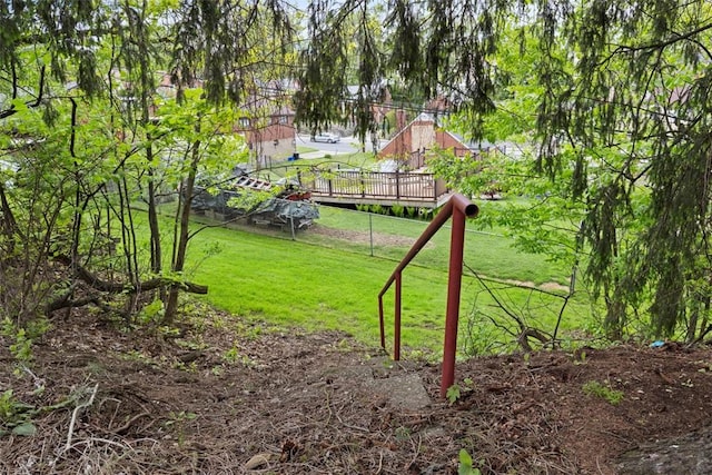 1023 Harrison St, Bethel Park, PA 15234 - view of green lawn featuring a wooden deck
