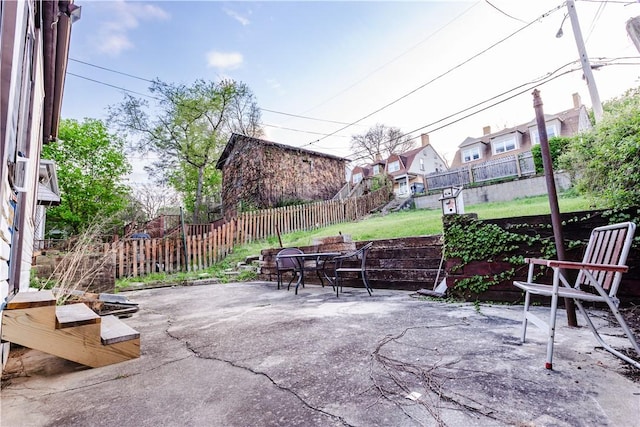 351 Center Ave, West View, PA 15229 - view of patio with outdoor dining space, a fenced backyard, and a residential view