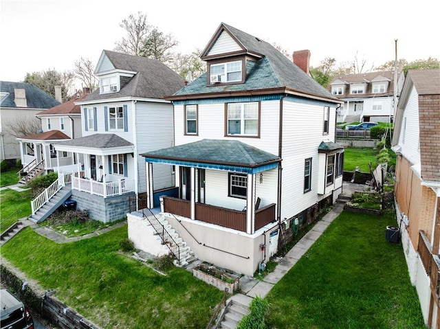 351 Center Ave, West View, PA 15229 - view of front facade with stairway, a porch, a front yard, and a residential view