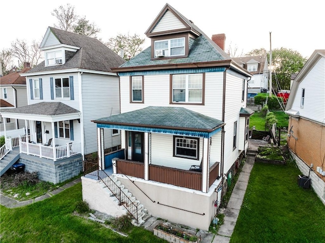 351 Center Ave, West View, PA 15229 - back of property with covered porch, stairs, and a yard