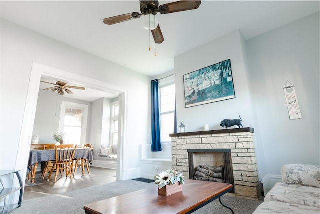 351 Center Ave, West View, PA 15229 - living room with ceiling fan, a stone fireplace, and baseboards