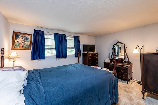 bedroom featuring light colored carpet