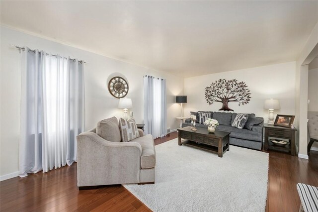 9204 Douglas Fir Dr, Plum Boro, PA 15239 - living area with dark wood-style floors and baseboards