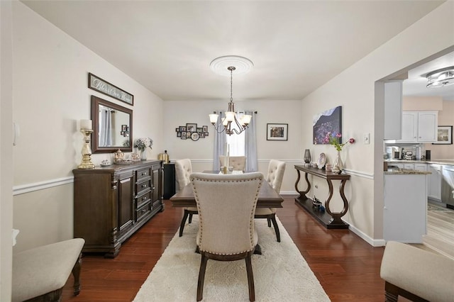 9204 Douglas Fir Dr, Plum Boro, PA 15239 - dining room featuring a chandelier, dark wood-style floors, and baseboards